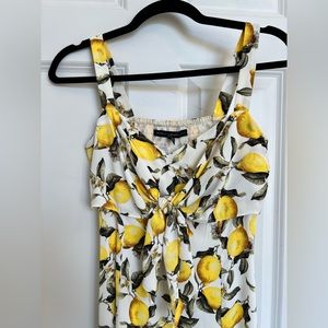 Spring or Summer lemon cello print dress. Tied in front A-line